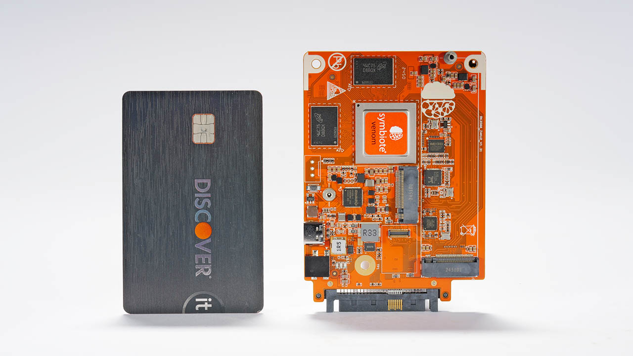 A credit card next to a Symbiote bare metal server